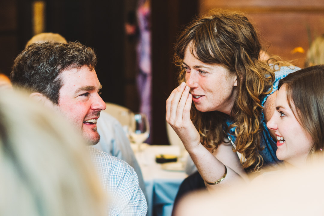candid wedding photo of guests