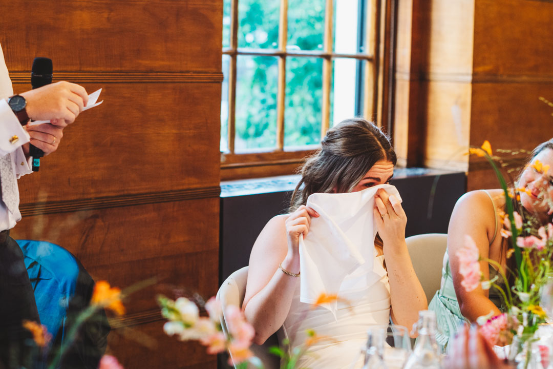 bride wiping up tear