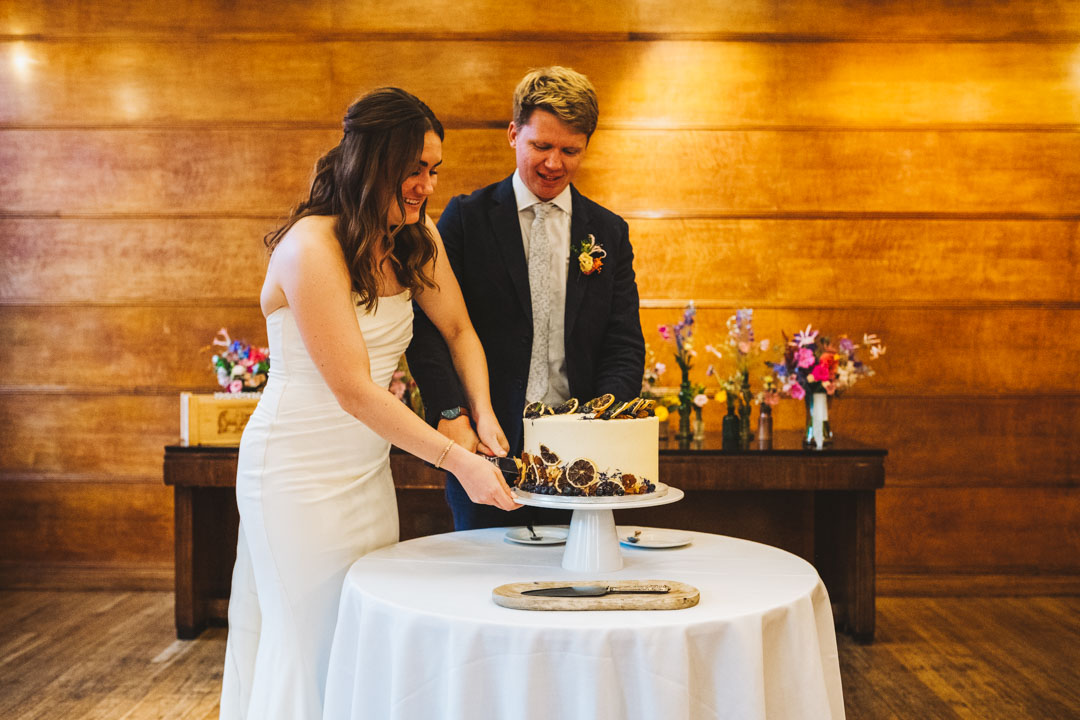 Bethnal Green Town Hall Hotel wedding cake cutting