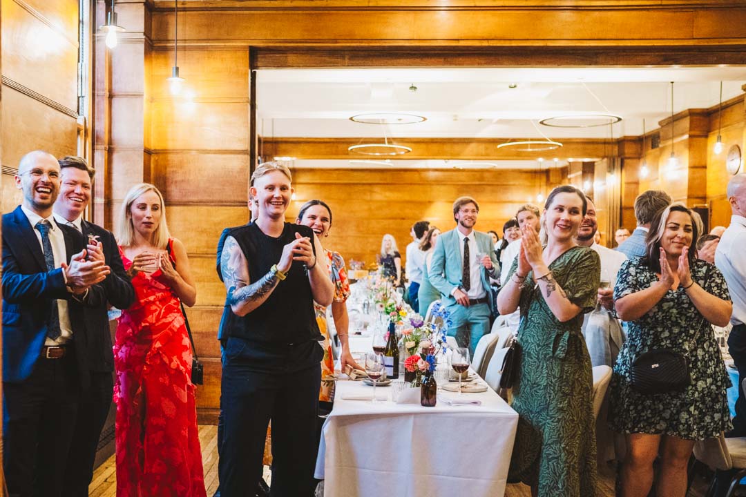 wedding guests clapping