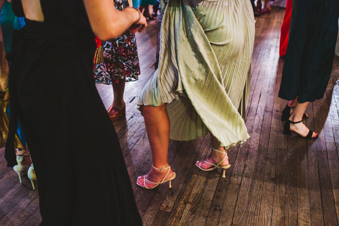 quirky wedding photo legs on dancefloor