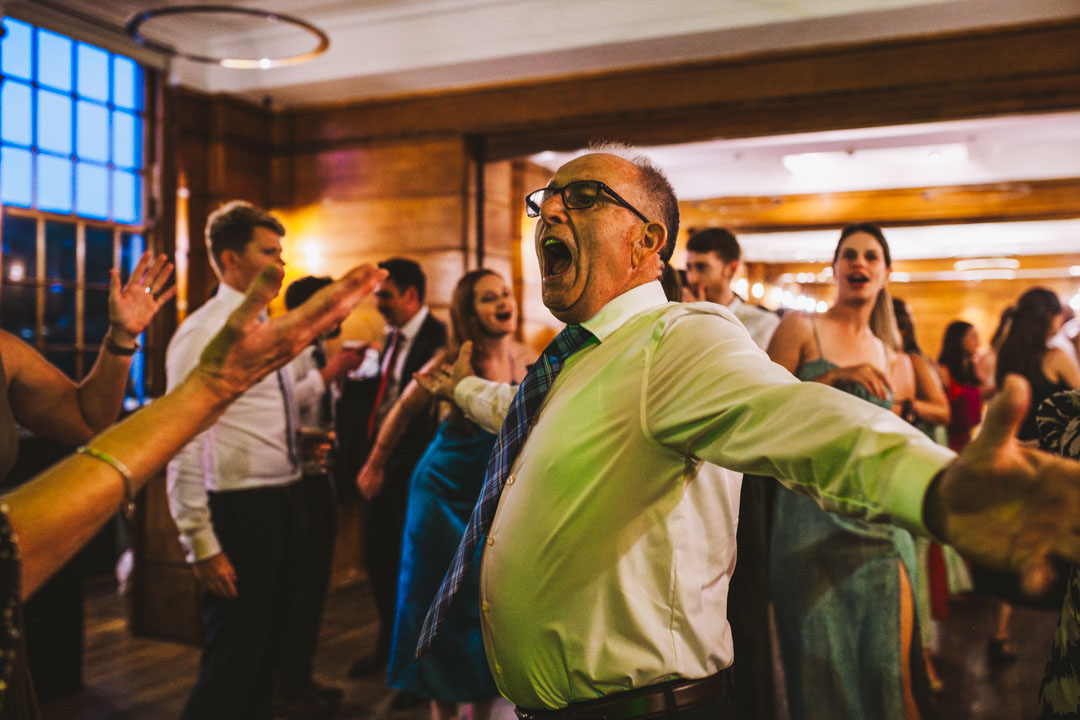 candid wedding photos guest on dancefloor