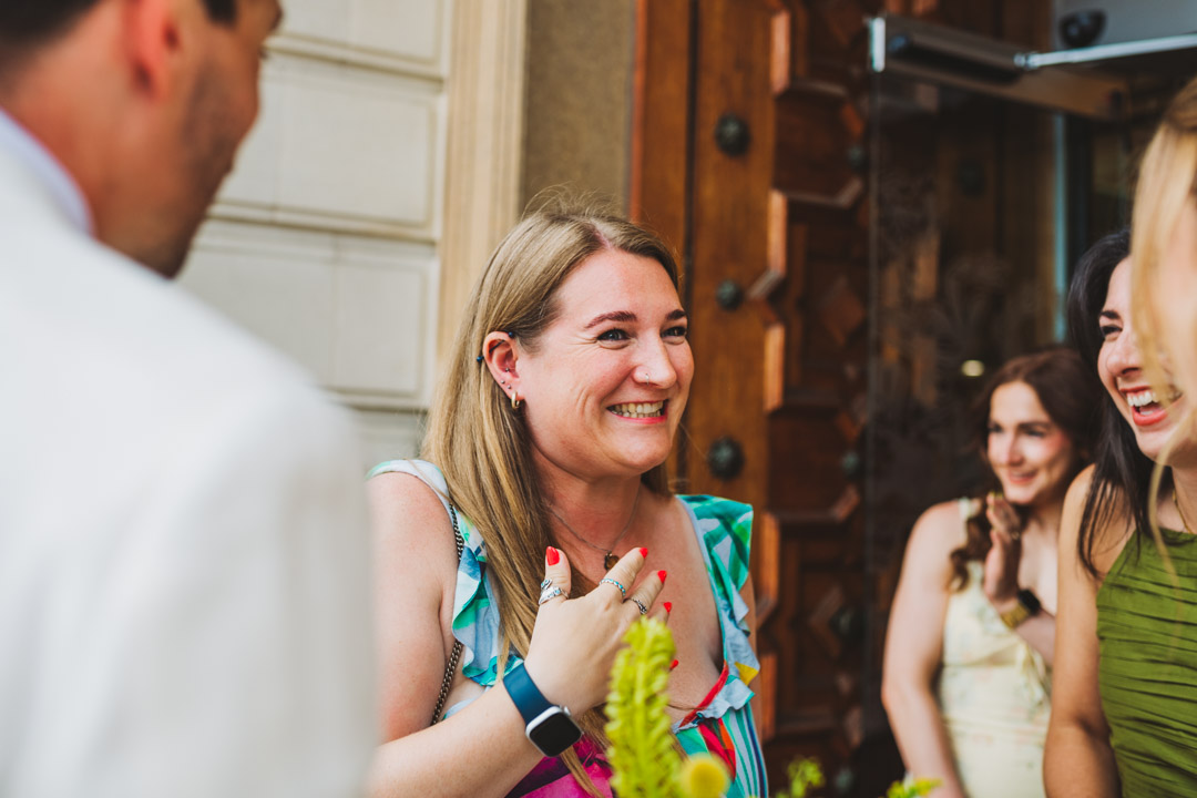Waltham Forest Town Hall wedding friends chatting with bride