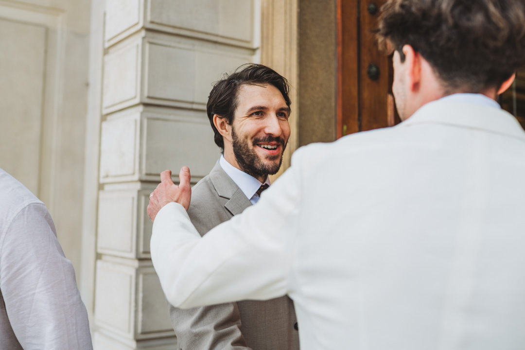 Waltham Forest Town Hall wedding groom greeting friend