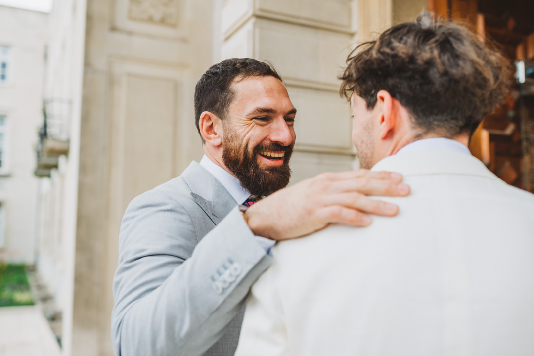Waltham Forest Town Hall wedding bestman congratulating groom