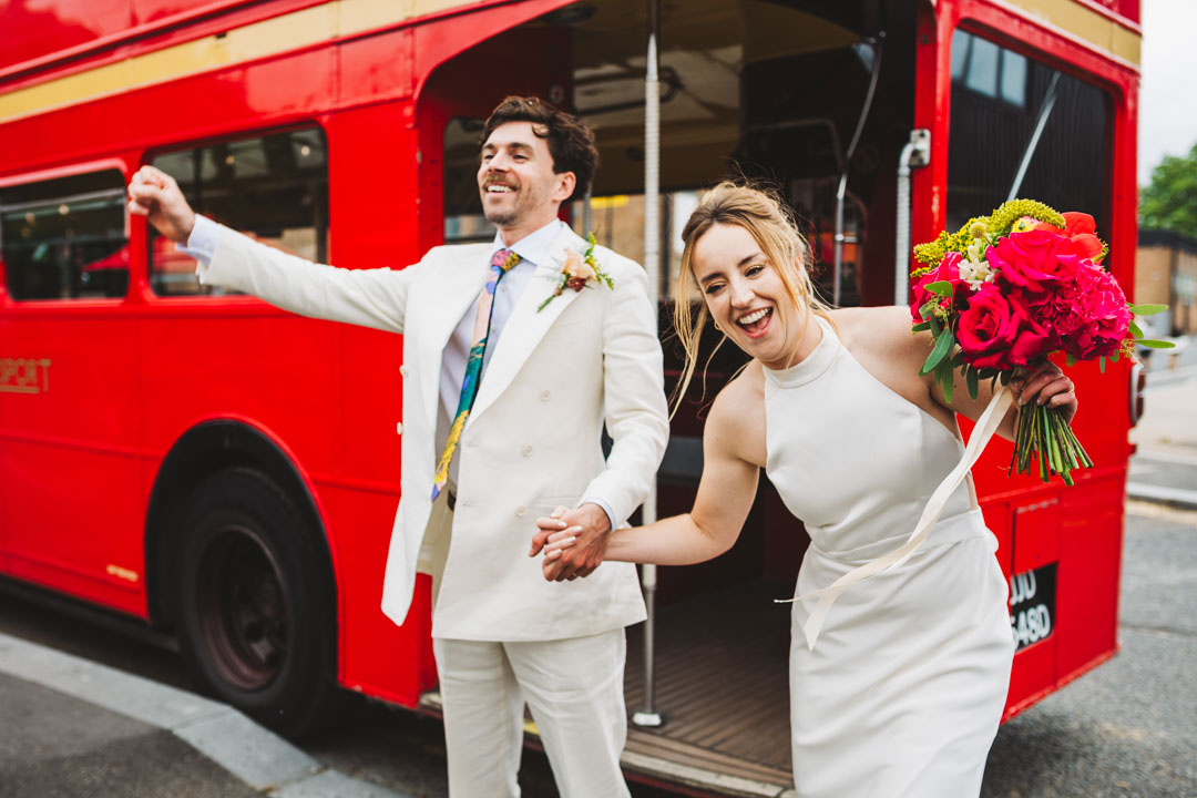 Waltham Forest Town Hall wedding couple jumping off bus