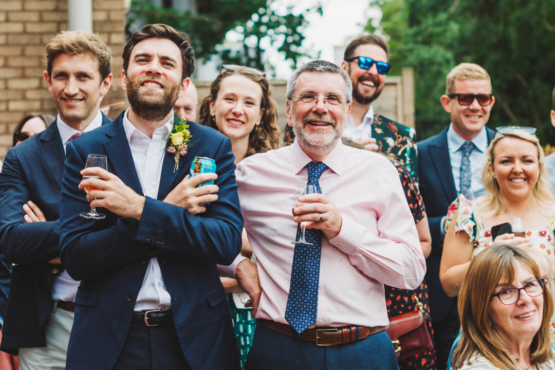 guests listening to groom's speech