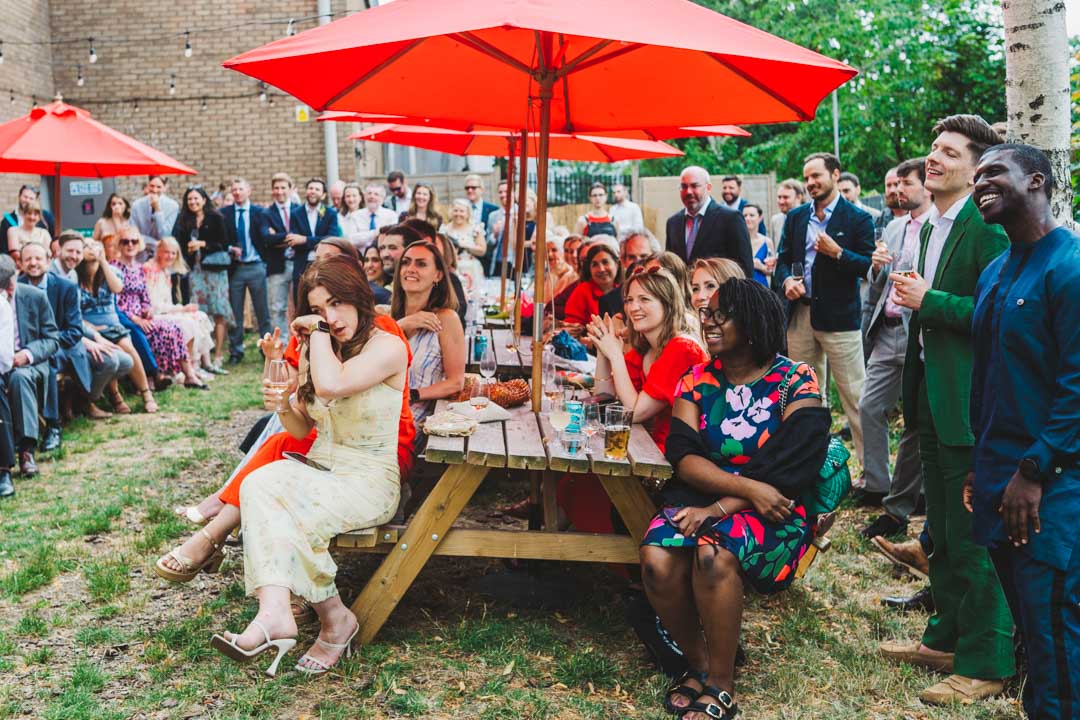 guests listening to bride's speech