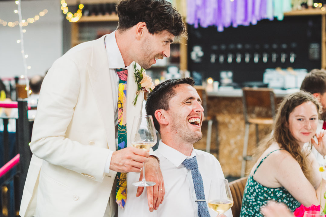 groom chatting with friend