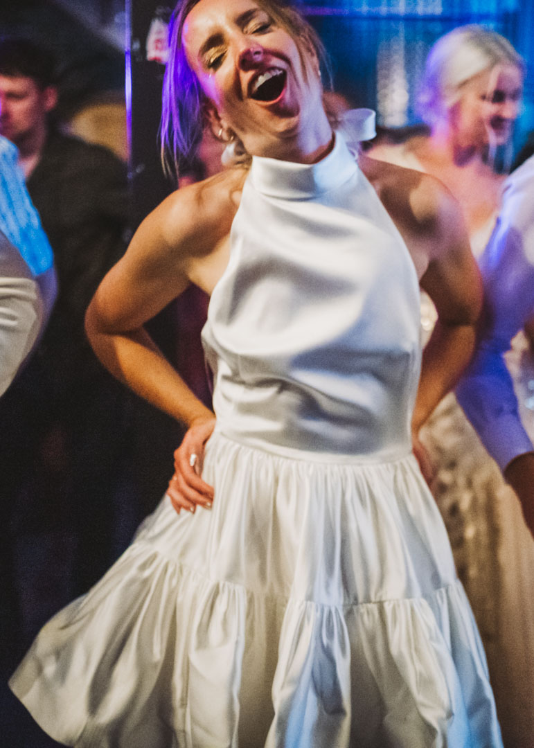 Renegade Urban Winery wedding party bride dancing