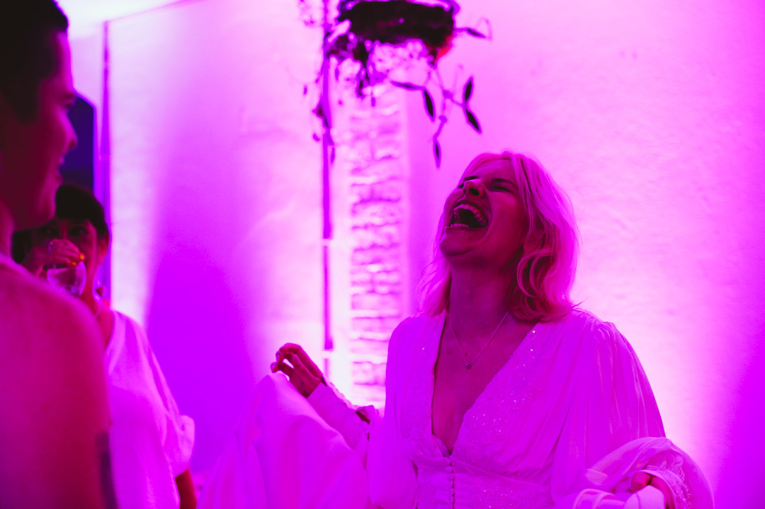 dancefloor bride laughing