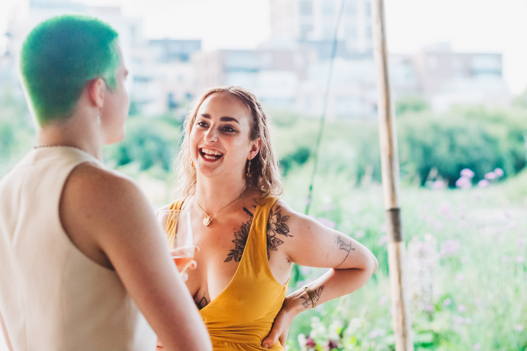wedding guest chatting and smiling
