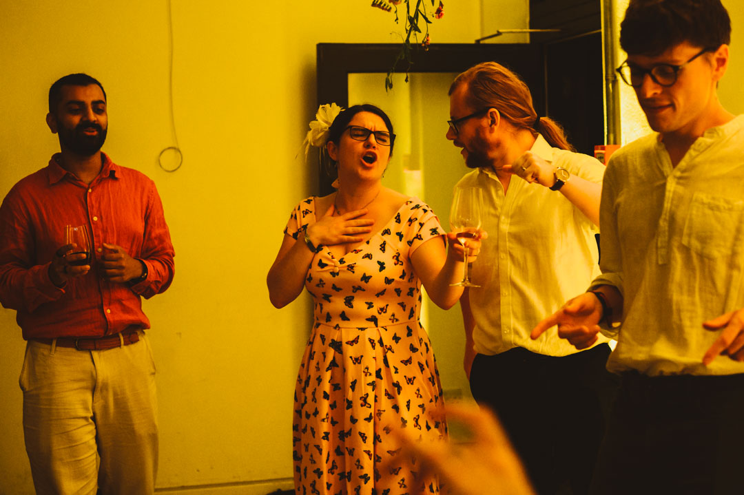wedding guests singing